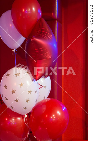 Red and white balloons with stars pattern. Balloon 61375122