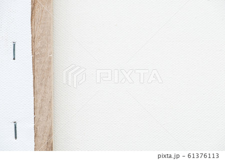 Backside of the wooden border on the canvas frame. 61376113