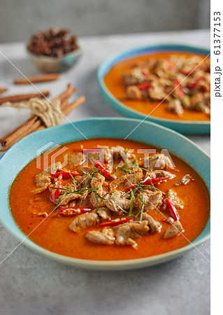 Dried red pork coconut curry, Thai cuisine. 61377153