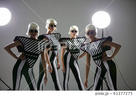 Dancing fashion girls on white background 5k Dancing fashion girls on white background 5k 61377275