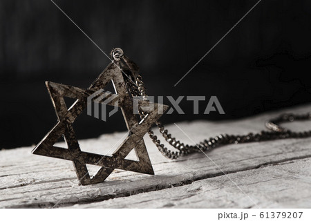 the star of david on a rustic wooden surface 61379207