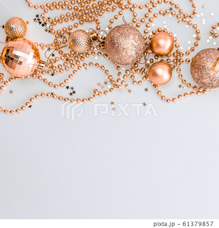 Christmas holidays composition, top view of gold Christmas decorations and garland with lights on a 61379857