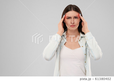 Woman showing headache. Woman showing headache. 61380402