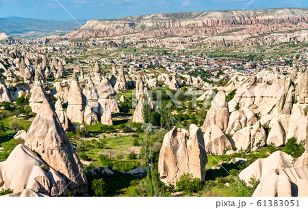 Chimneys rock formations at Cappadocia in Turkey Chimneys rock formations at Cappadocia in Turkey 61383051