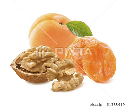 Walnuts, fresh and dry apricots isolated on white background 61383419