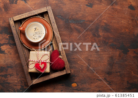 Valentines day card with gift and coffee cup 61385451