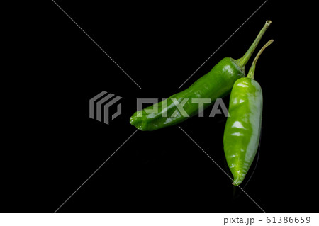 Green hot chilli peppers. Green hot chilli peppers. 61386659