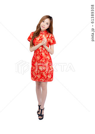 Beautiful portrait happy Chinese New Year young asian woman wear cheongsam fashion smile Beautiful portrait happy Chinese New Year young asian woman wear cheongsam fashion smile 61389308