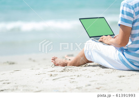 Lifestyle young asian man working on laptop  61391993