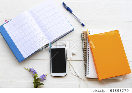 notbook monthly planner with mobile phone for business work of lifestyle at office 61393270