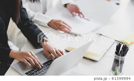 Close up view of businessman typing on laptop 61399994