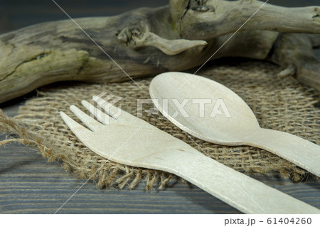 Wooden utensils in eco friendly product still life Wooden utensils in eco friendly product still life 61404260