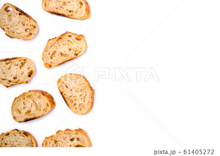 Frame of pieces of white bread isolated on white background. 61405272