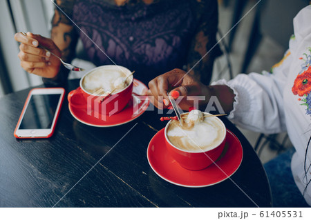Girls rest in the cafe 61405531