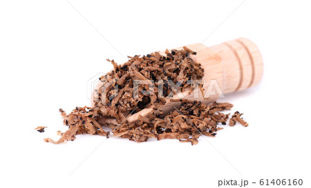 Grated Truffle on a wooden spoon. Fresh black truffles isolated on a white background. Delicacy exclusive truffle mushroom. Piquant and fragrant French delicacy. Clipping path. Grated Truffle on a wooden spoon. Fresh black truffles isolated on a white background. Delicacy exclusive truffle mushroom. Piquant and fragrant French delicacy. Clipping path. 61406160