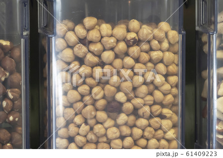 Dispensers with nuts in zero waste shop. New trend 61409223