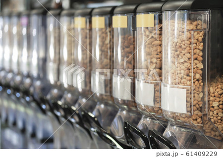 Dispensers with nuts in zero waste shop. New trend 61409229