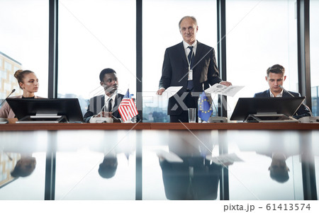 Business leader with report Business leader with report 61413574