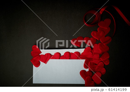 Valentine's day,a Declaration of love. White envelope with red hearts. Valentine. On a dark gray background. 61414199