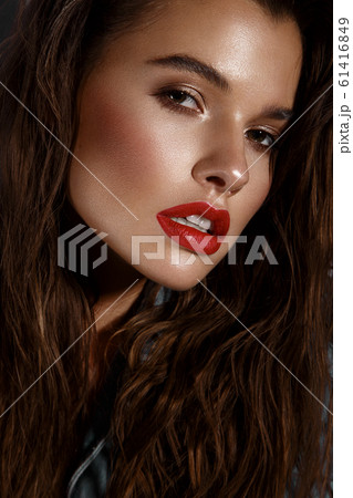 Beautiful sexy girl with bright makeup, red lips, wet hair. Beauty face. Beautiful sexy girl with bright makeup, red lips, wet hair. Beauty face. 61416849
