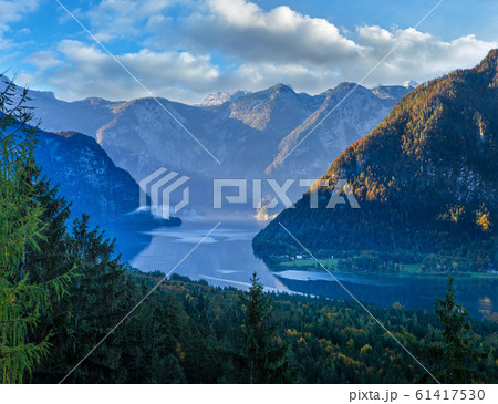Peaceful morning autumn Alps mountain lake with Peaceful morning autumn Alps mountain lake with 61417530