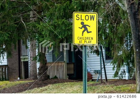 Children at play warning road sign outdoors 61422686