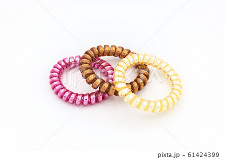 Colorful hair bands isolated on white background 61424399
