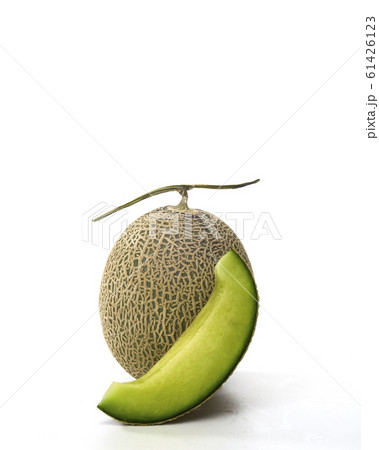 Fresh green melon and slice on white 61426123