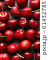 Photos from above, fresh fruit cherries covered, drops of water covered. 61432785