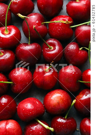 Photos from above, fresh fruit cherries covered, drops of water covered. Photos from above, fresh fruit cherries covered, drops of water covered. 61432785