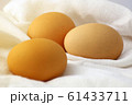 Lay eggs to prepare food on a white cloth on the table, Eggs for cooking, Food ingredients. 61433711