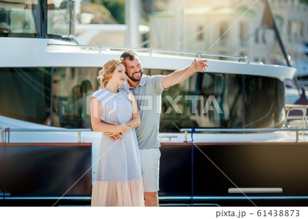 Summer vacation with the whole family on the sea coast in the Marina with yachts 61438873