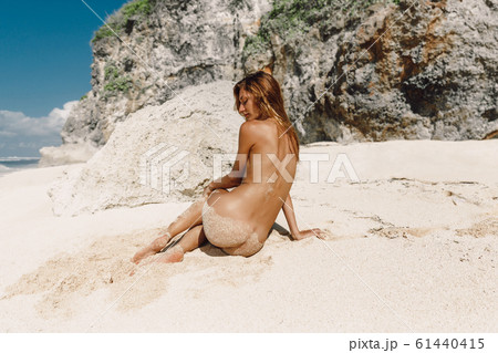 Beach Nude Girls - Young naked woman at tropical ocean beach. Slim... - Stock Photo [61440415]  - PIXTA