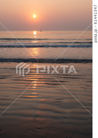 Nature background of seashore beach wave and coastline sand with sunset 61441347