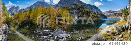 Sunny autumn alpine Tappenkarsee lake and rocky 61441489