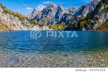 Sunny autumn alpine Tappenkarsee lake and rocky Sunny autumn alpine Tappenkarsee lake and rocky 61441503