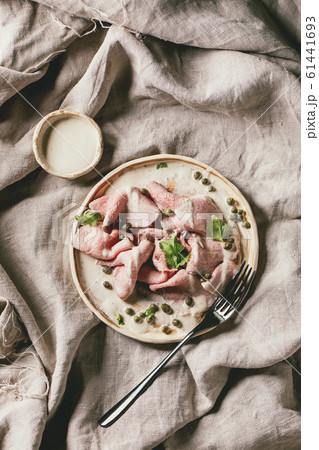 Vitello tonnato sliced veal 61441693