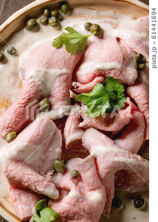 Vitello tonnato sliced veal 61441694
