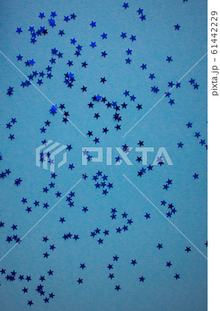 Blue-green-aquamarine background with festive shiny stars. Copy space. Postcard template. Blue-green-aquamarine background with festive shiny stars. Copy space. Postcard template. 61442229