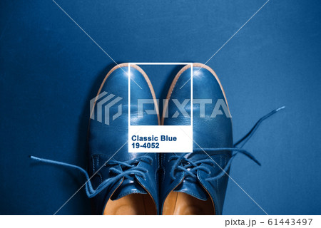 Blue men's leather shoes on dark background Blue men's leather shoes on dark background 61443497