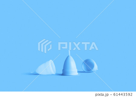 Menstrual cup on pink background. Alternative Menstrual cup on pink background. Alternative 61443592