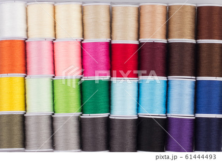 close up of colorful cone of threads close up of colorful cone of threads 61444493