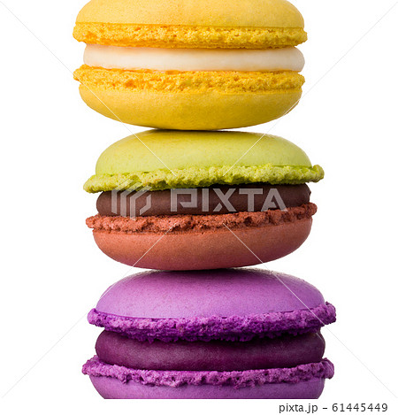 Stack of french colorful macaroons on table isolated on white background Stack of french colorful macaroons on table isolated on white background 61445449