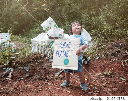 The little child girl holding "Save the planet" The little child girl holding "Save the planet" 61454578