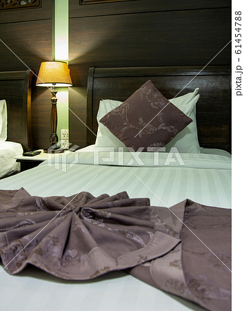 Bedroom Interior with Pillow and Table Lamp 61454788