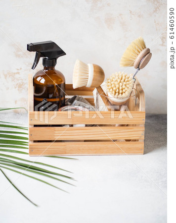 Zero waste home cleaning concept. Various items and ingredients for eco home cleaning in wood box. Copy space Zero waste home cleaning concept. Various items and ingredients for eco home cleaning in wood box. Copy space 61460590