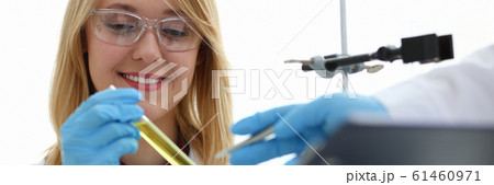 Technician hold in arms in protective gloves 61460971
