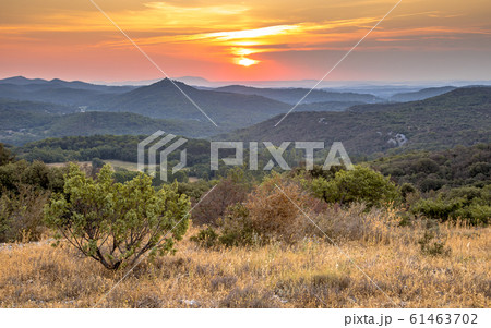 Orange Sunrise over Cevennes national park Orange Sunrise over Cevennes national park 61463702