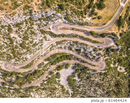 Aerial top down view of Hairbpin bend road 61464424