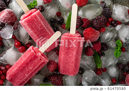 Homemade berry popsicles 61470580